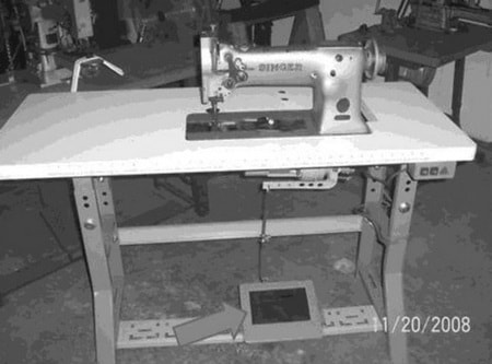 Foot pedal sewing machine