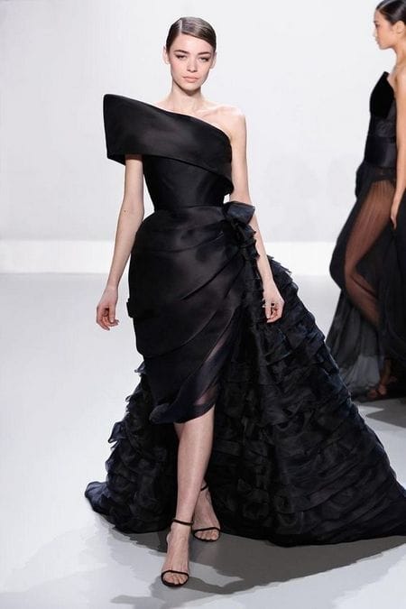 Silk Gazar haute couture gown with asymmetric peplum.