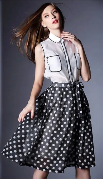 Dots are uses on dress design as a elements of fashion design